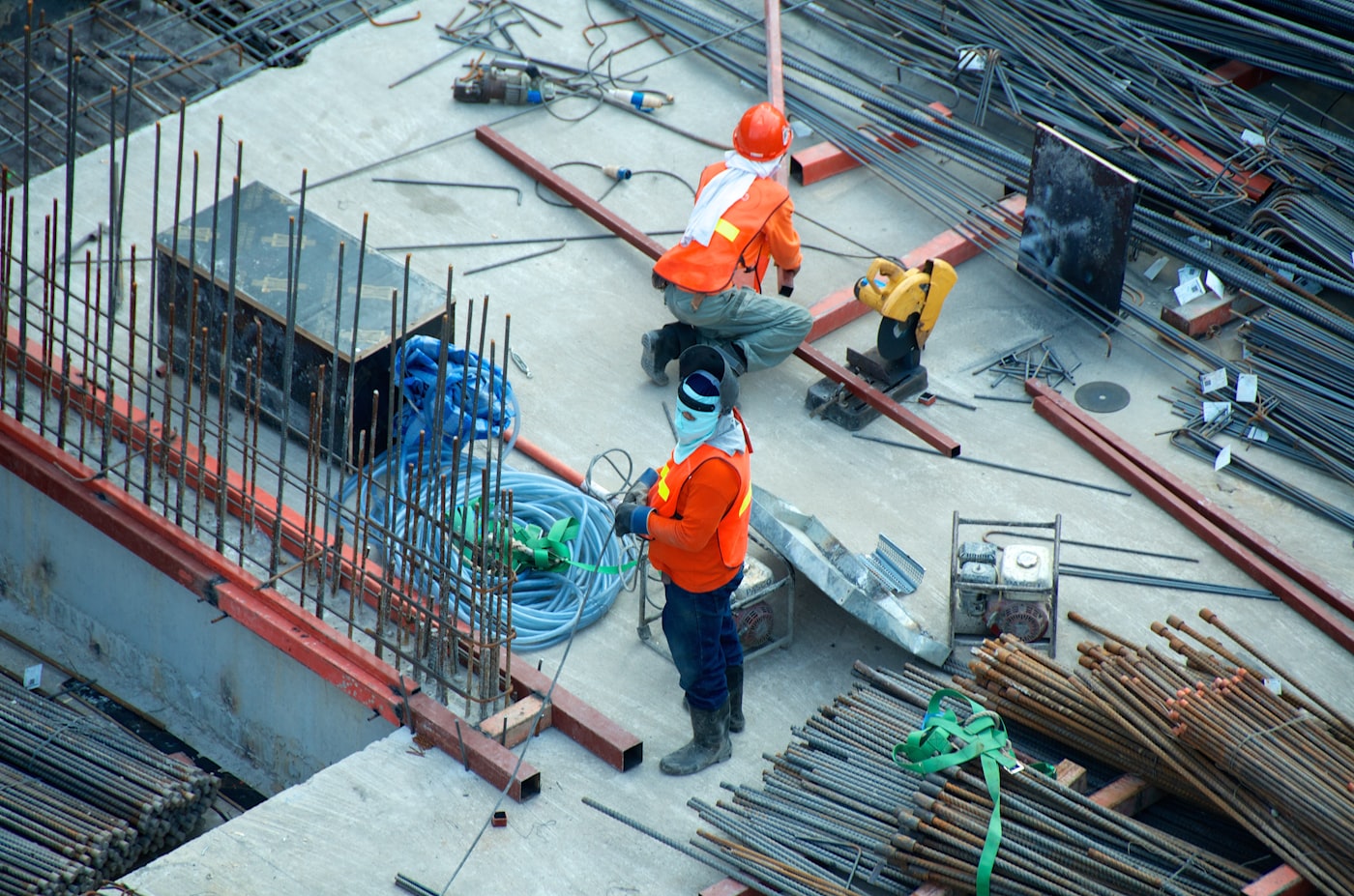 Two Avon Construction workers coordinating on a build site